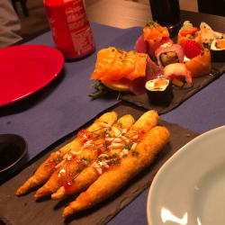 16 pieces of sushi and the shrimp tempura