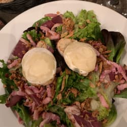 Hot goat cheese with bacon and duck ham