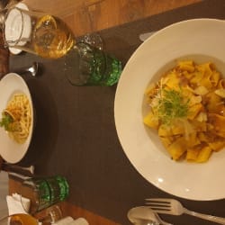 Parpadella with meat und parmesan 